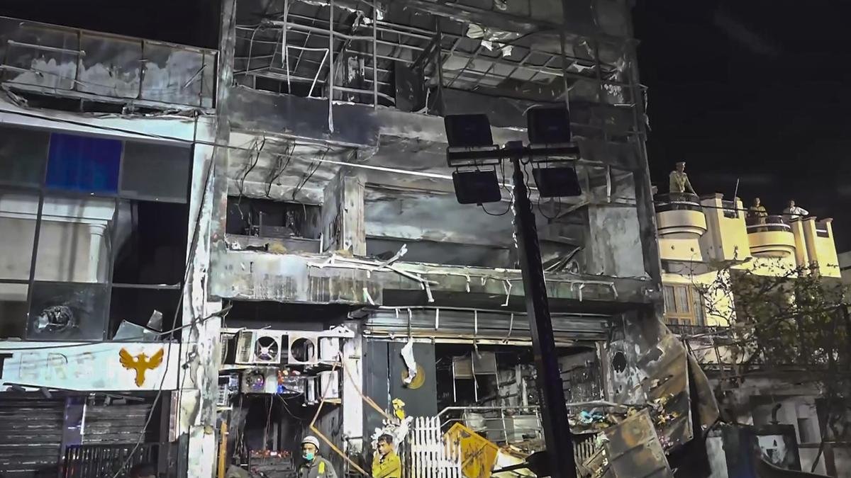 Charred remains of the site of a fire in Lucknow, on June 22, 2026.