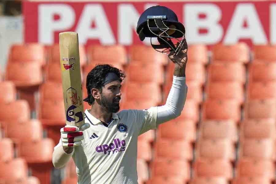 India's KL Rahul celebrates his century on day one of a Test cricket match between India and Afghanistan, in Mullanpur, Saturday, June 6, 2026.